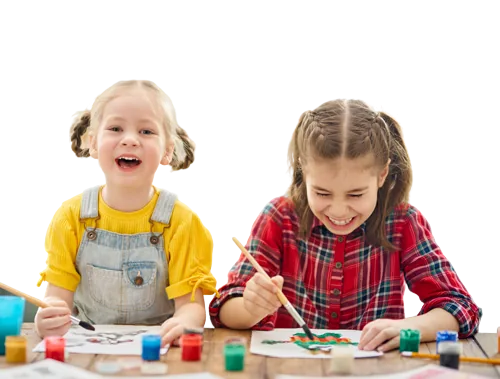 Two smiling children painting at a table